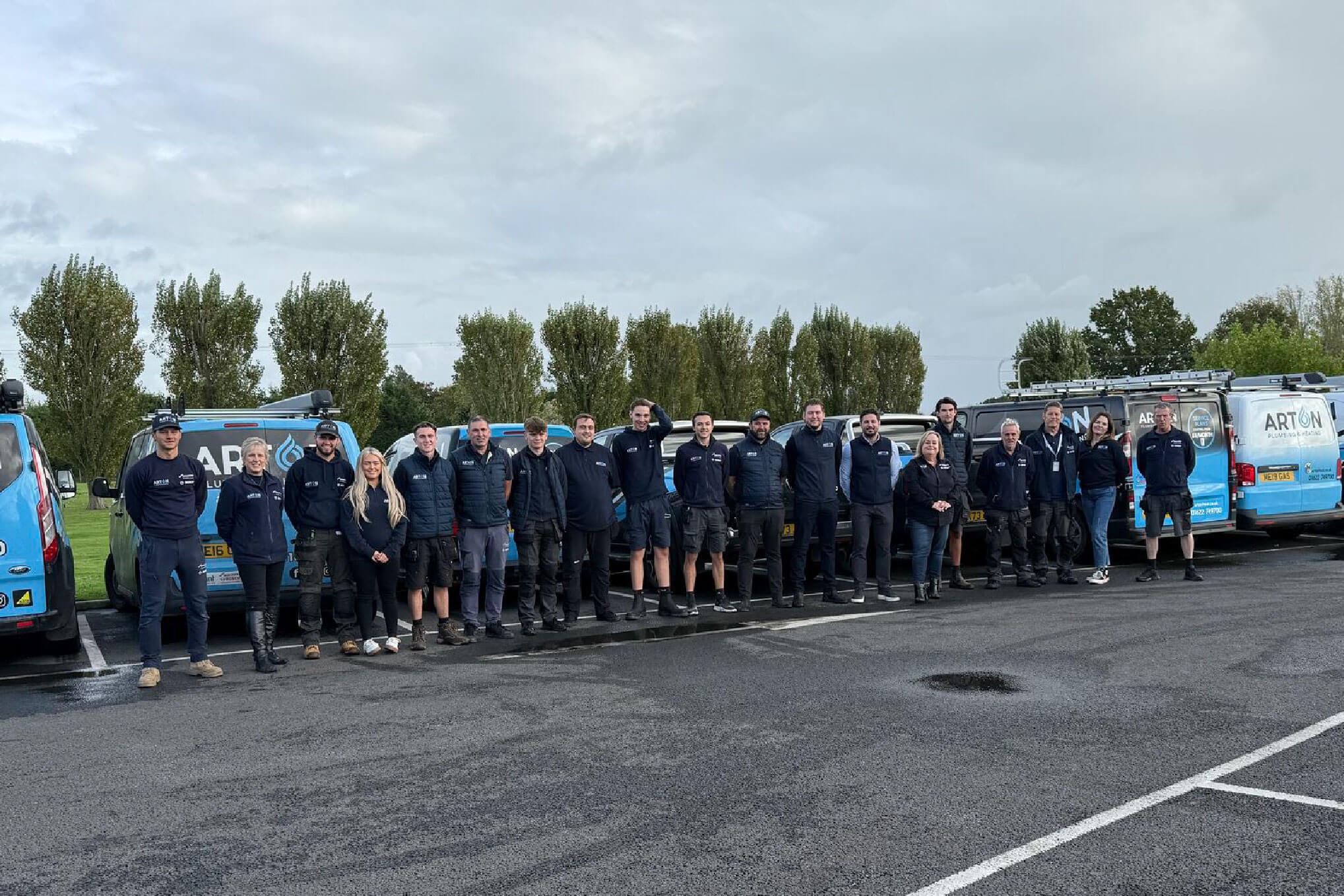 Arton Heating team photo outside with vans